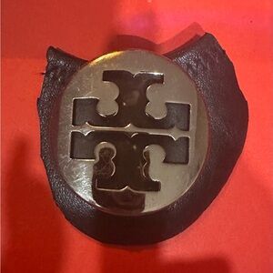 💜 Tory Burch emblem for bags, shoes, cloths , jeans. Very versatile.